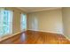 Bright bedroom with hardwood floors and large windows at 117 Biscayne Ct, Mooresville, NC 28117