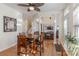 Casual dining area with a glass-top table and four chairs, near kitchen at 117 Biscayne Ct, Mooresville, NC 28117