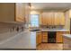Close up of the kitchen with tile backsplash, stainless sink and dishwasher at 117 Biscayne Ct, Mooresville, NC 28117
