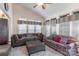 Sunlit sitting area with two sofas and ottomans, near bedroom at 117 Biscayne Ct, Mooresville, NC 28117