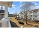 Bright balcony with a view of manicured grounds and mature trees at 11735 Ridgeway Park Dr, Charlotte, NC 28277