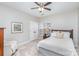 Bright bedroom with a double bed, soft natural light, and a cozy reading chair at 11735 Ridgeway Park Dr, Charlotte, NC 28277