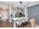 Modern kitchen with gray cabinets, stainless steel appliances, and stylish pendant lighting at 11735 Ridgeway Park Dr, Charlotte, NC 28277