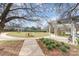 Lush park area featuring paved walkways, picnic tables, pergolas, and landscaped greenery, perfect for outdoor recreation at 11735 Ridgeway Park Dr, Charlotte, NC 28277