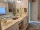 Double vanity bathroom with a large mirror and access to another room at 1180 Asheford Green Ave # 46, Concord, NC 28027