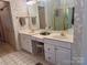 Double vanity bathroom with a large mirror at 1180 Asheford Green Ave # 46, Concord, NC 28027