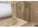 Bathroom with soaking tub, shower, and double vanity at 1180 Asheford Green Ave # 46, Concord, NC 28027