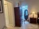 Bedroom with armoire and window at 1180 Asheford Green Ave # 46, Concord, NC 28027