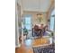 Bright dining room with hardwood floors and chandelier at 1180 Asheford Green Ave # 46, Concord, NC 28027