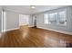 Spacious dining area with hardwood floors and window at 1215 Neal Hawkins Rd, Gastonia, NC 28056