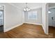 Simple dining room with hardwood floors and classic trim at 1215 Neal Hawkins Rd, Gastonia, NC 28056