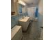 Bathroom with light blue tile and shower/tub combo at 1217 Burke Rd, Shelby, NC 28152