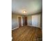 Spacious bedroom with hardwood floors and double closet at 1217 Burke Rd, Shelby, NC 28152