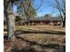 Brick ranch house with a large yard at 1217 Burke Rd, Shelby, NC 28152