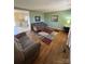 Spacious living room featuring hardwood floors and a view of the kitchen at 1217 Burke Rd, Shelby, NC 28152