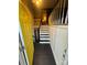 Entryway with yellow door and staircase to upper level at 1309 Poplar Cir, Newton, NC 28658