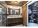 Updated bathroom with double vanity and barn door at 1432 Jules Ct, Charlotte, NC 28226