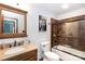 Well-appointed bathroom with tiled shower/tub combo and granite vanity at 1432 Jules Ct, Charlotte, NC 28226