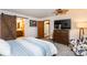 Bedroom with ceiling fan, dresser and TV at 1432 Jules Ct, Charlotte, NC 28226