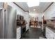 Galley style kitchen with stainless steel appliances and slate flooring at 1432 Jules Ct, Charlotte, NC 28226