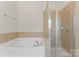 Bathroom with garden tub and separate shower at 1527 Sunflower Field Pl, Matthews, NC 28104