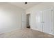 Spacious bedroom featuring double closets and neutral decor at 1527 Sunflower Field Pl, Matthews, NC 28104