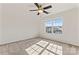 Well-lit bedroom with ceiling fan and large window at 1527 Sunflower Field Pl, Matthews, NC 28104