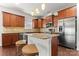 Modern kitchen with stainless steel appliances and an island at 1527 Sunflower Field Pl, Matthews, NC 28104