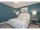 King-size bed in a spacious bedroom with light blue walls at 1575 Herlong Ct, Rock Hill, SC 29732