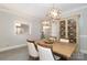 Elegant dining room with a farmhouse table and stylish decor at 1575 Herlong Ct, Rock Hill, SC 29732