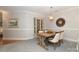 Spacious dining room featuring a wooden table and display cabinet at 1575 Herlong Ct, Rock Hill, SC 29732