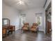 Bedroom with two leather armchairs and hardwood floors at 1652 Brook Dr, Fort Mill, SC 29708