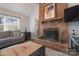 Brick fireplace with wood mantel in living room at 1652 Brook Dr, Fort Mill, SC 29708