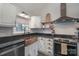 Kitchen with copper farm sink and rustic cabinets at 1652 Brook Dr, Fort Mill, SC 29708