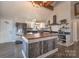 Modern kitchen with farmhouse-style cabinets and copper sink at 1652 Brook Dr, Fort Mill, SC 29708