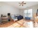 Secondary bedroom with wood floors and a built in desk at 16737 Winston Oaks Ct # 297, Charlotte, NC 28213