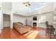 Living room with hardwood floors, fireplace and large windows at 16737 Winston Oaks Ct # 297, Charlotte, NC 28213