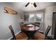 Small dining area with a round table and four chairs, adjacent to the kitchen at 1750 Melrose Dr, Shelby, NC 28152