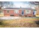 Brick ranch house with a front porch and small yard at 1750 Melrose Dr, Shelby, NC 28152