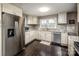 Modern kitchen featuring granite countertops and stainless steel appliances at 1750 Melrose Dr, Shelby, NC 28152