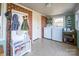 Convenient laundry room with washer, dryer, and coat rack at 1750 Melrose Dr, Shelby, NC 28152