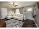 Living room with beige sectional sofa, hardwood floors, and a view of the front yard at 1750 Melrose Dr, Shelby, NC 28152