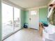 Bright mudroom with sliding glass door, tile floor, and built-in storage at 1750 Melrose Dr, Shelby, NC 28152