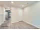 Simple hallway with light walls and wood-look floors at 1754 J Julian Ln, Charlotte, NC 28208