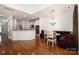 Breakfast nook with built-in banquette seating and chandelier at 20215 Middletown Rd, Cornelius, NC 28031