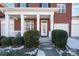 Inviting front entrance with white columns and brick facade at 20215 Middletown Rd, Cornelius, NC 28031