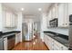 Modern kitchen featuring stainless steel appliances and ample cabinetry at 20215 Middletown Rd, Cornelius, NC 28031