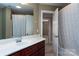 Bathroom with a vanity, large mirror, and shower at 205 Micah Ln # 33, Iron Station, NC 28080