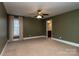 Bedroom with carpet, neutral walls, and ceiling fan at 205 Micah Ln # 33, Iron Station, NC 28080