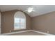 Bright bedroom featuring an arched window and ceiling fan at 205 Micah Ln # 33, Iron Station, NC 28080